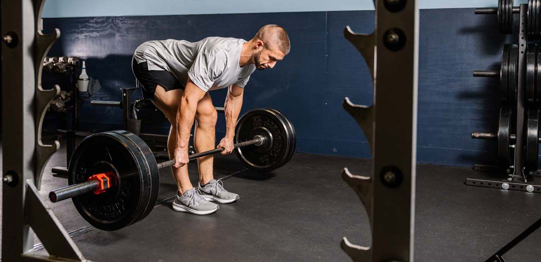 Guy doing a deadlift with perfect form